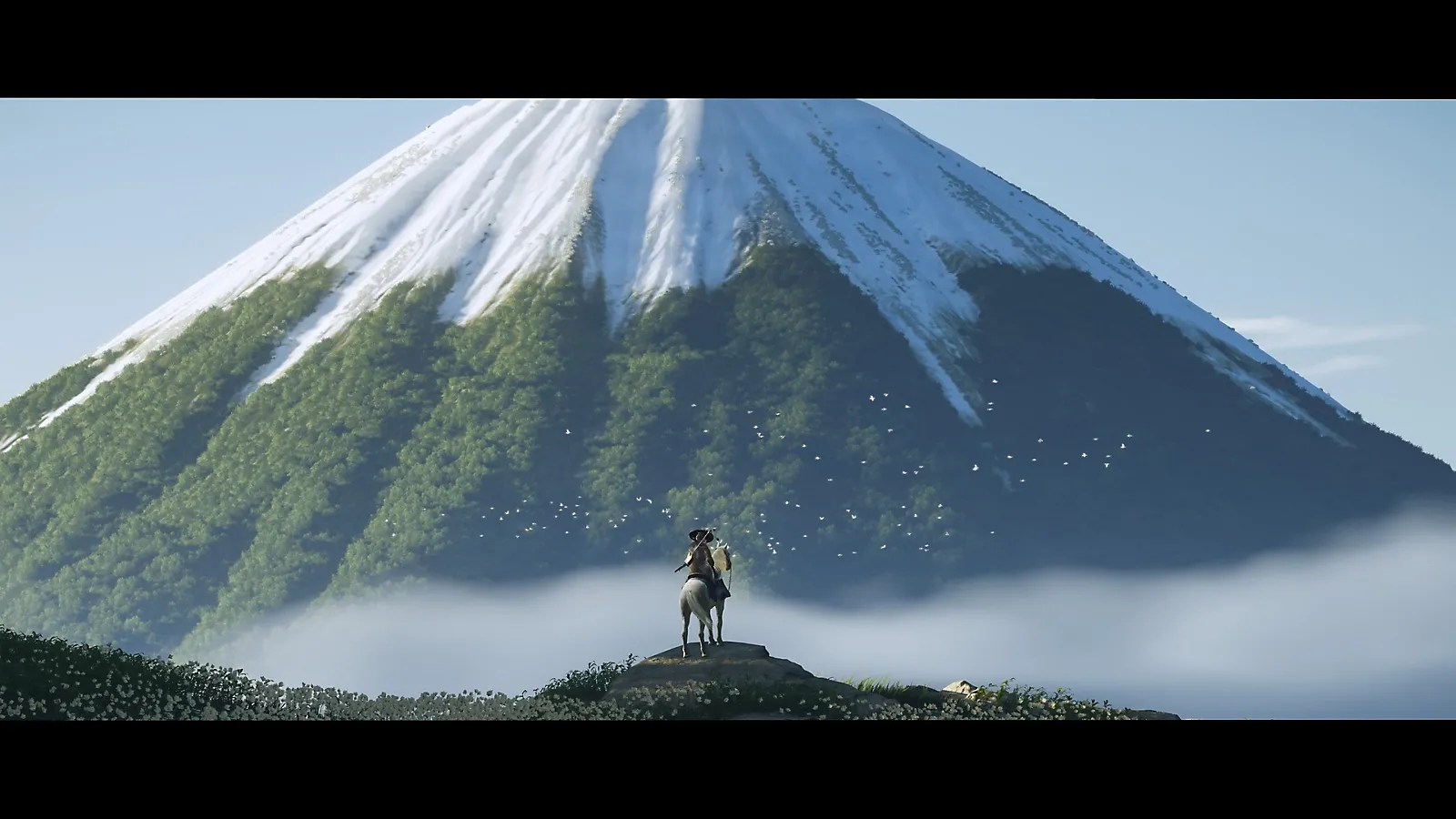 Atsu nhìn ra đỉnh núi Yotei hùng vĩ trong Ghost of Yotei
