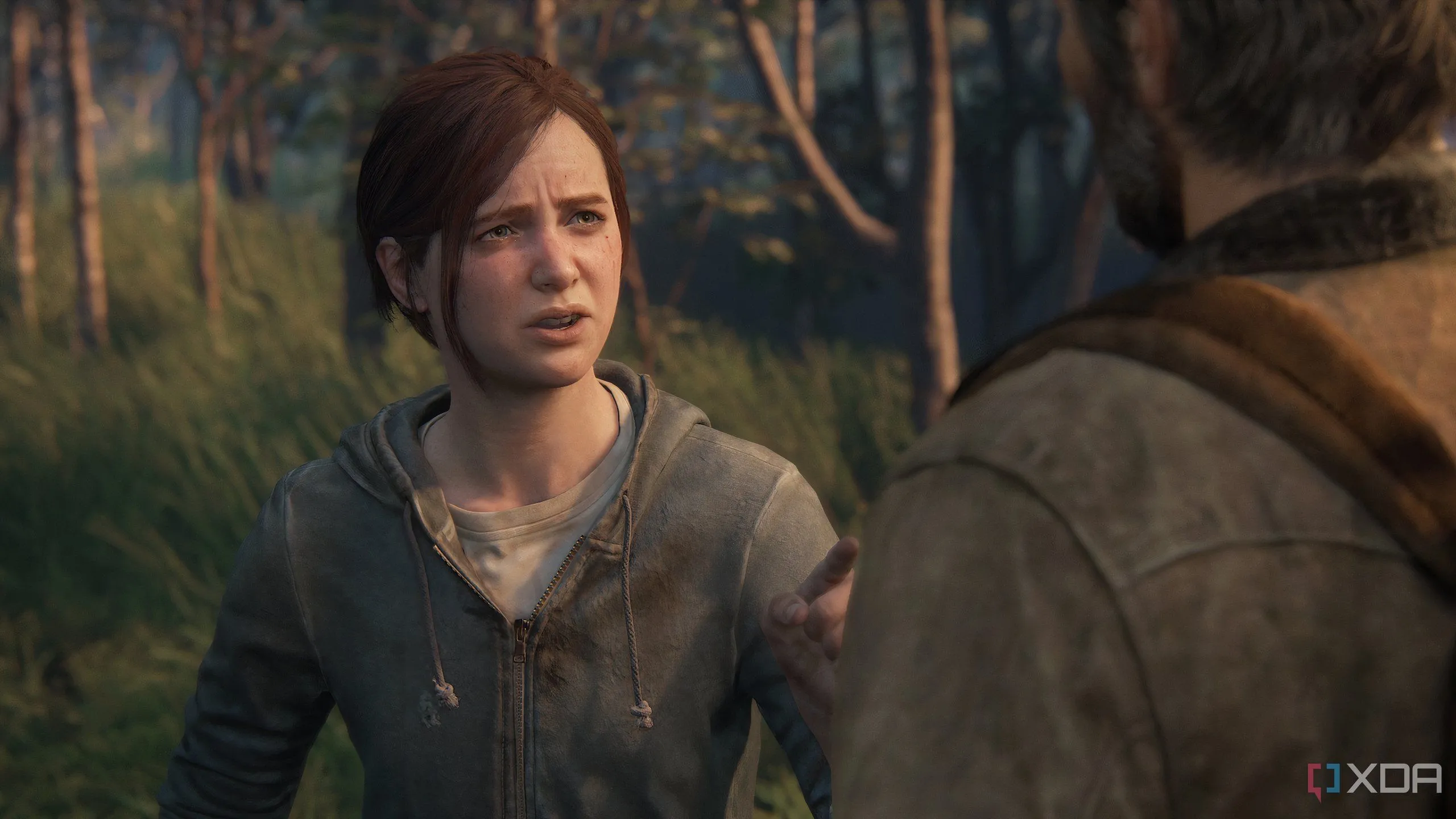 Cảnh hội thoại đầy cảm xúc giữa Ellie và Joel trong The Last of Us Part II Remastered, thể hiện mối quan hệ phức tạp của họ.