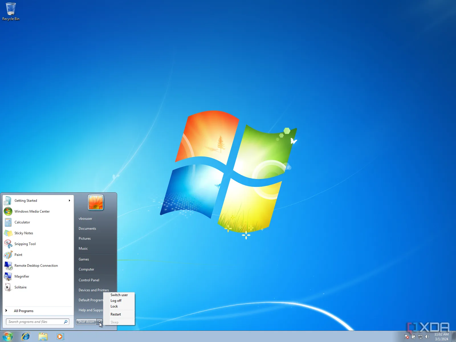 Giao diện menu Start của Windows 7, minh họa hệ điều hành được nâng cấp sau Windows XP