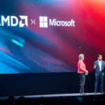 Giao diện Microsoft Copilot trên màn hình với logo AMD và Microsoft