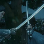 Hai samurai đối mặt trong trận đấu kiếm căng thẳng trong game Rise of the Ronin, thể hiện gameplay hành động và đa dạng vũ khí.