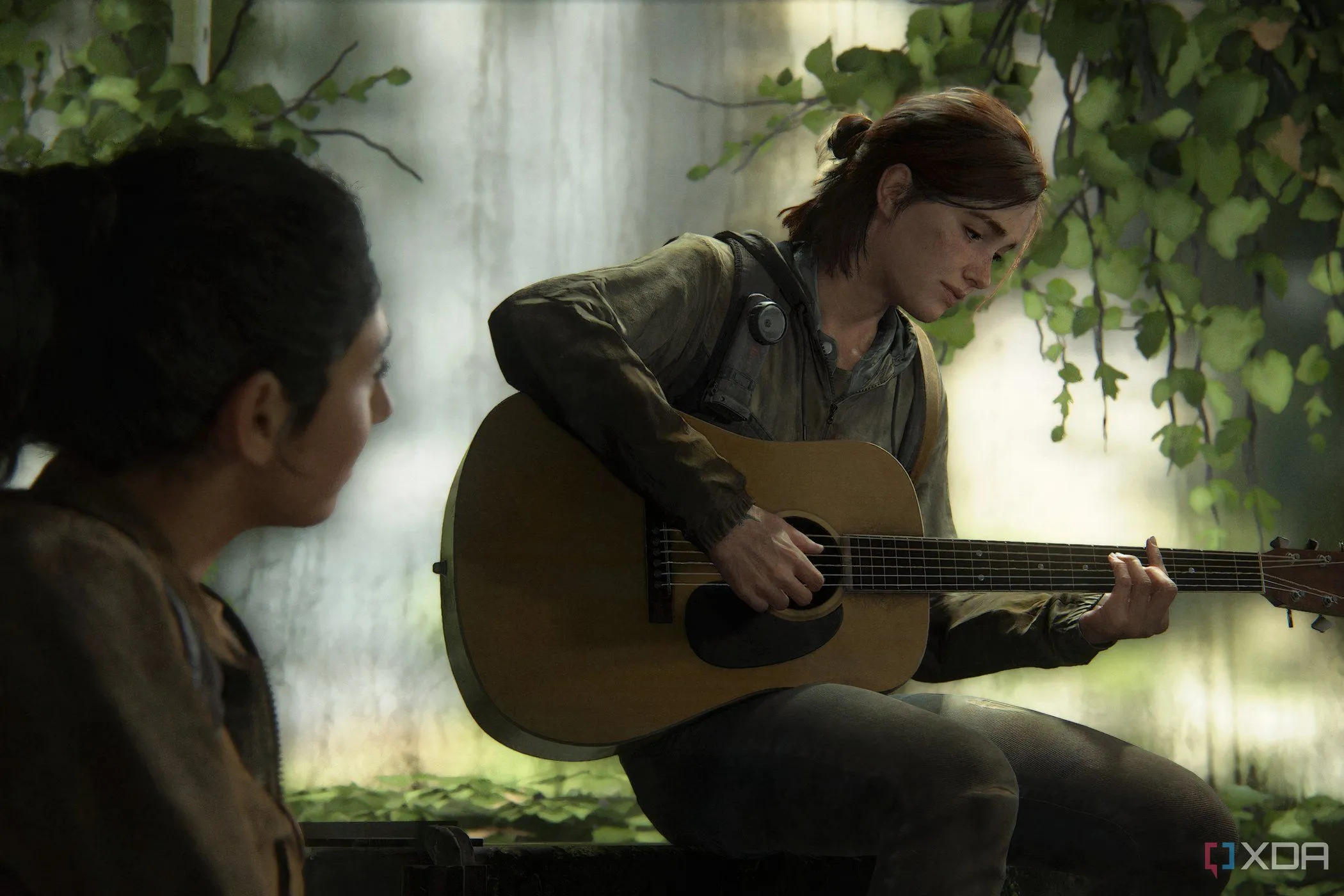 Hình ảnh Ellie chơi guitar từ The Last of Us Part II, thể hiện khoảnh khắc tĩnh lặng và sâu lắng