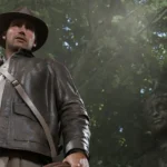Indiana Jones trong khung cảnh mạo hiểm với chiếc roi, minh họa đồ họa cao cấp của game thế hệ mới.