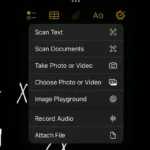 iPad đang quét tài liệu bằng tính năng máy quét tích hợp trong ứng dụng Ghi chú của Apple