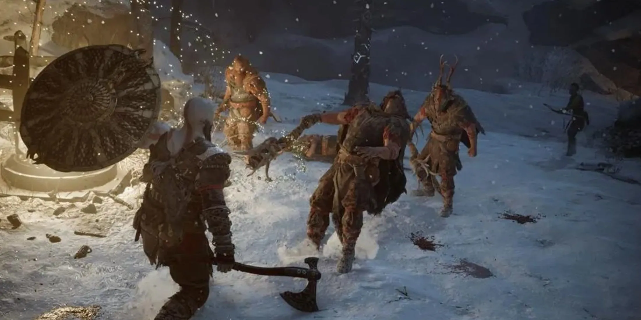 Kratos khám phá một khu vực đầy tuyết phủ, thể hiện đồ họa tuyệt đẹp của God of War Ragnarok