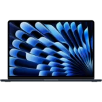 Laptop Apple MacBook Air M3 15-inch màu bạc trên bàn làm việc cùng iPhone và phụ kiện