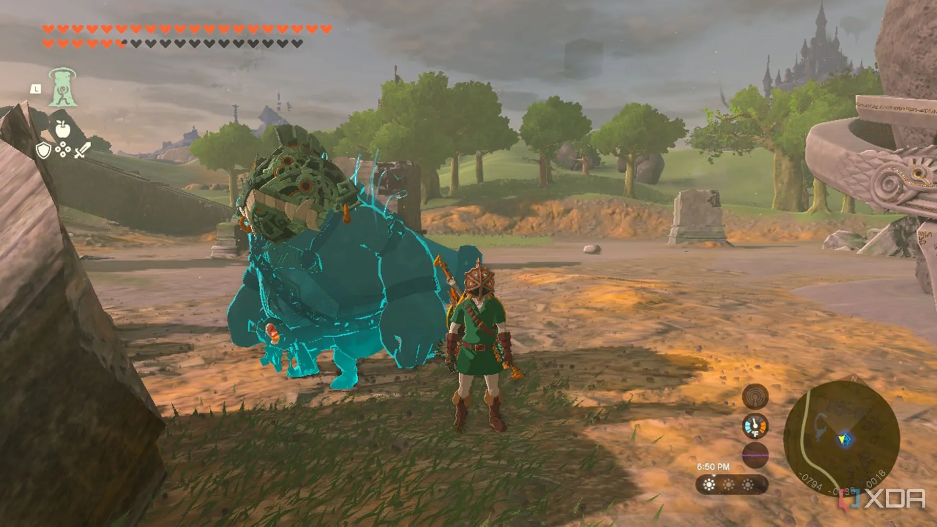 Link và tinh linh Yunobo đeo mặt nạ Divine Beast tượng trưng cho vùng của họ trong Zelda Tears of the Kingdom.