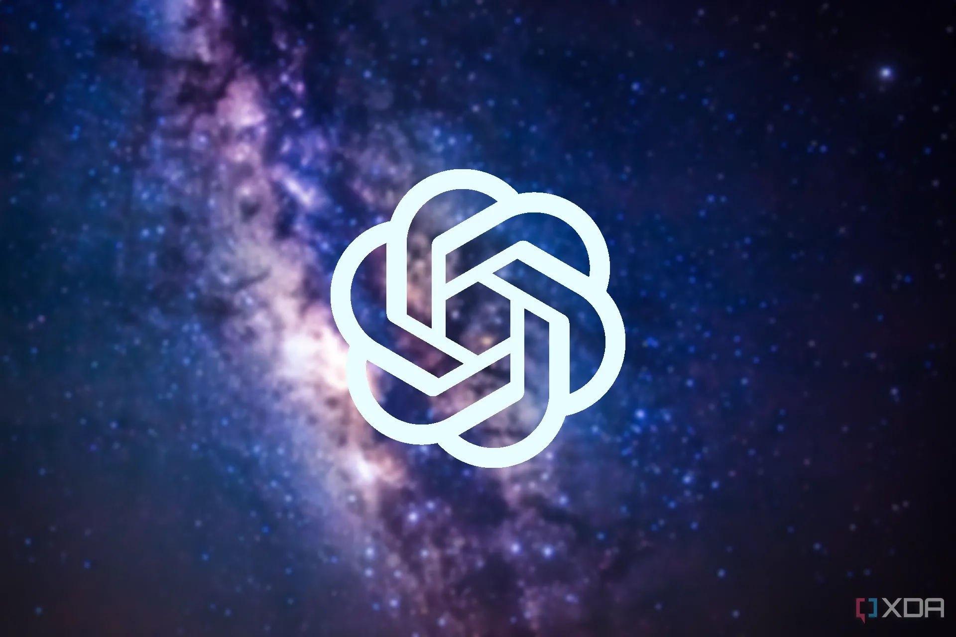 Logo OpenAI nổi bật trên nền không gian mờ, thể hiện tham vọng và tầm nhìn của trí tuệ nhân tạo