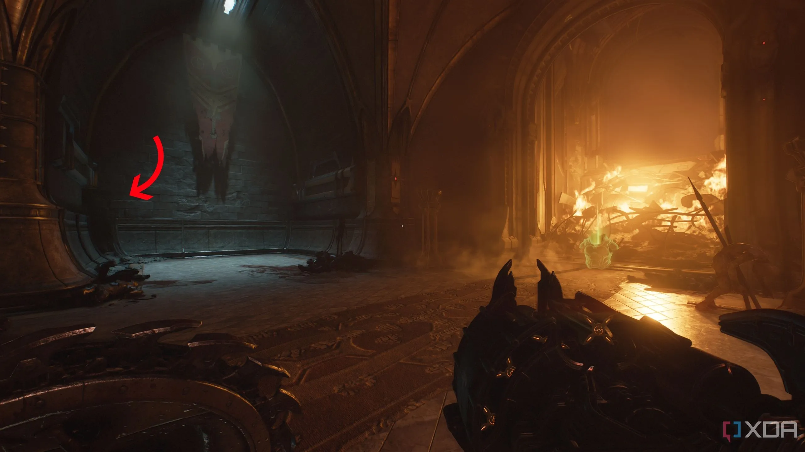 Một mũi tên chỉ vào khu vực bí mật trong bức tường ở Doom The Dark Ages Chapter 7