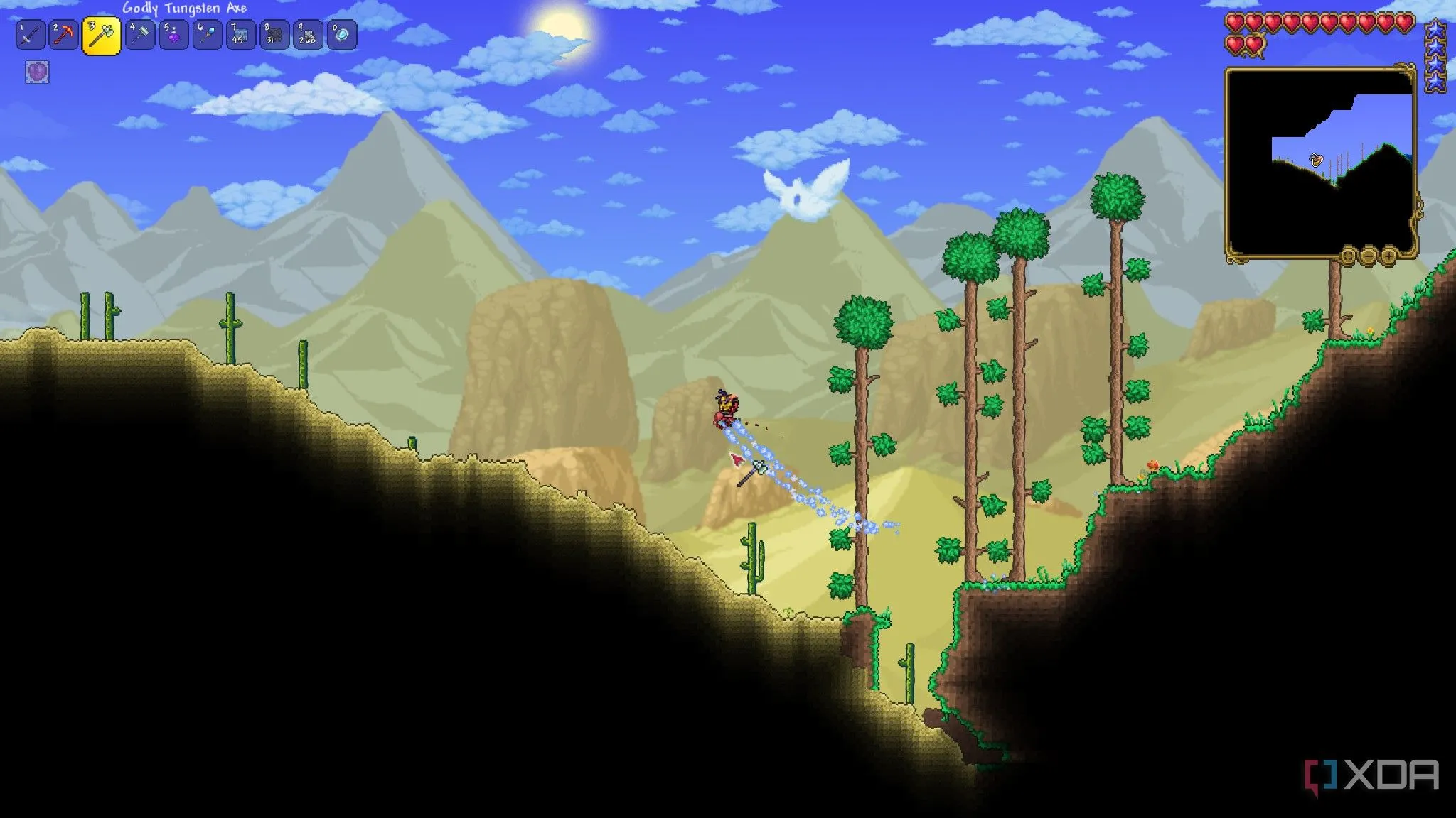Người chơi trong môi trường sa mạc đầy cát và xương rồng của Terraria